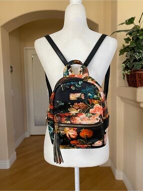 Floral-Print Black Mini Backpack with Tassel Accent